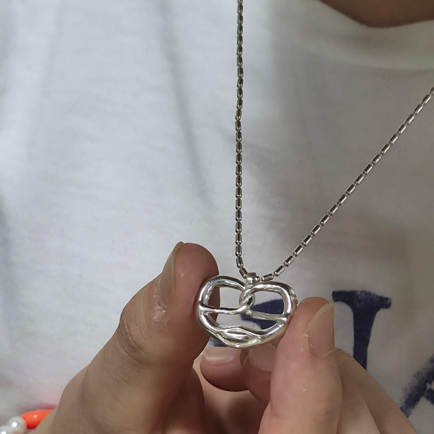 Pretzel Necklace On it 4