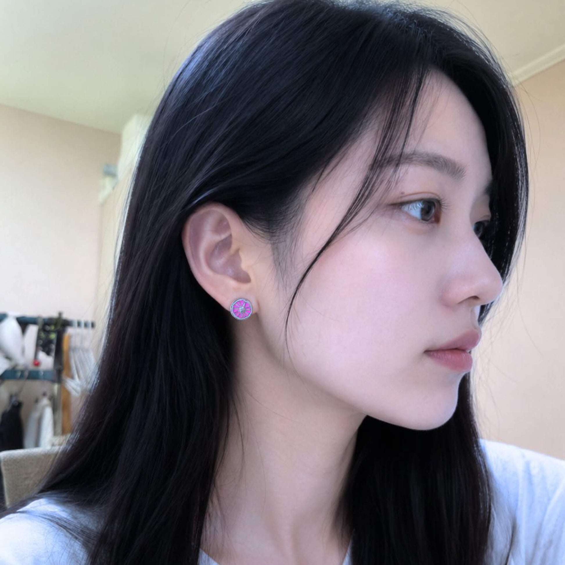 Orange earring on it 2