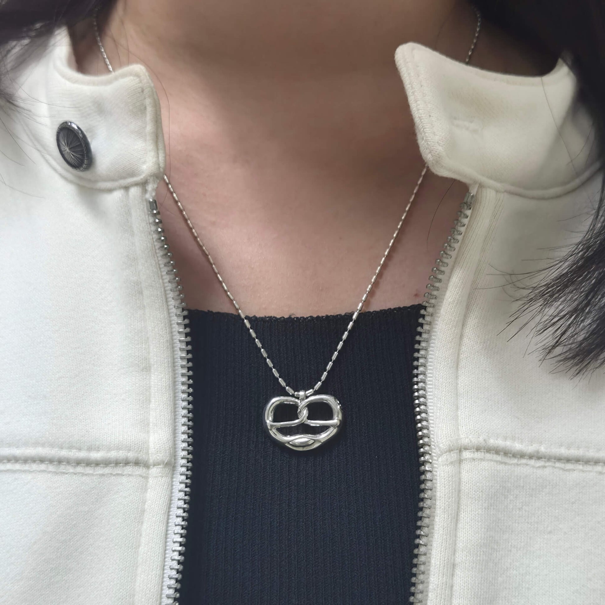 Pretzel Necklace On it