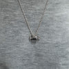 WearingMeatNecklaceFrontView