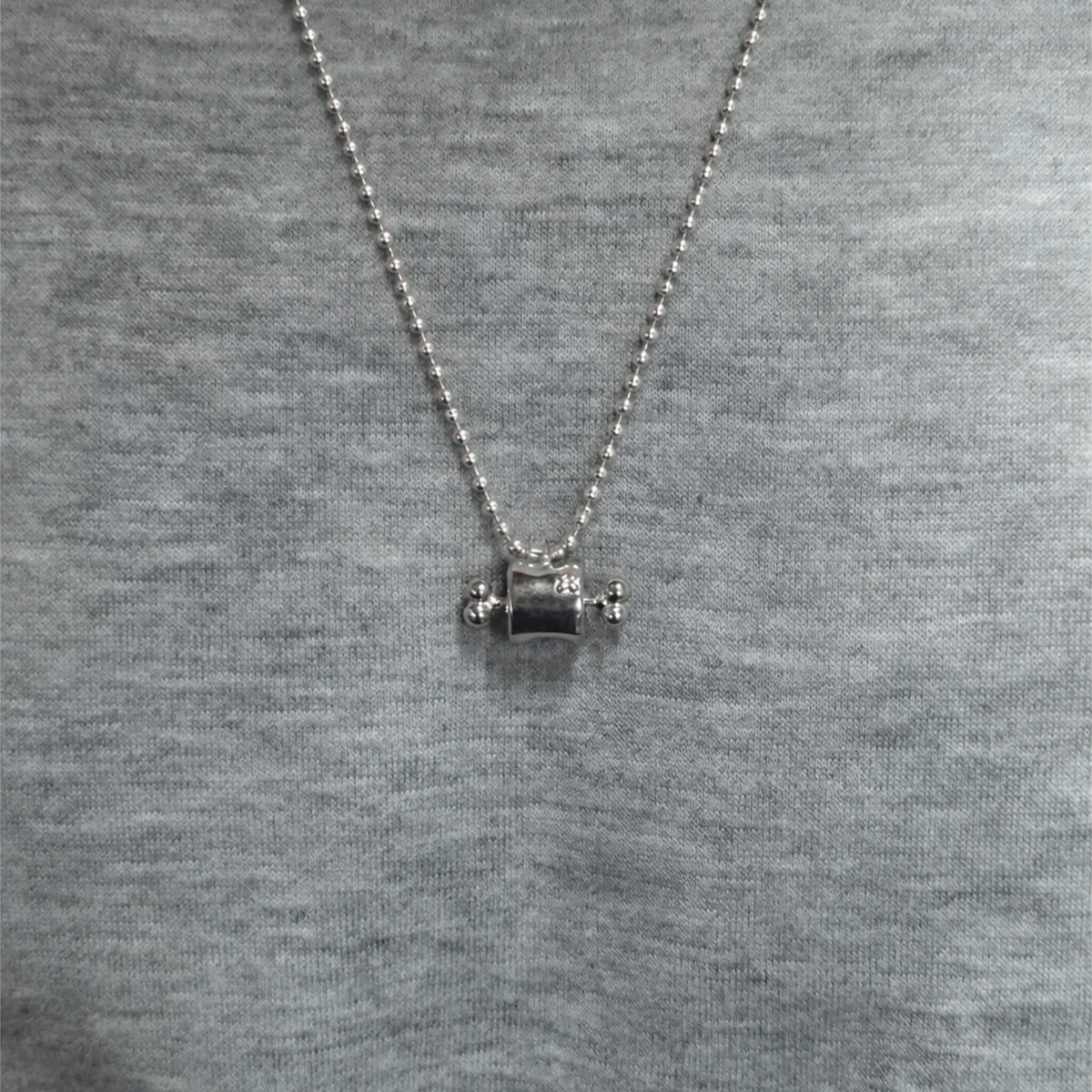 WearingMeatNecklaceFrontView