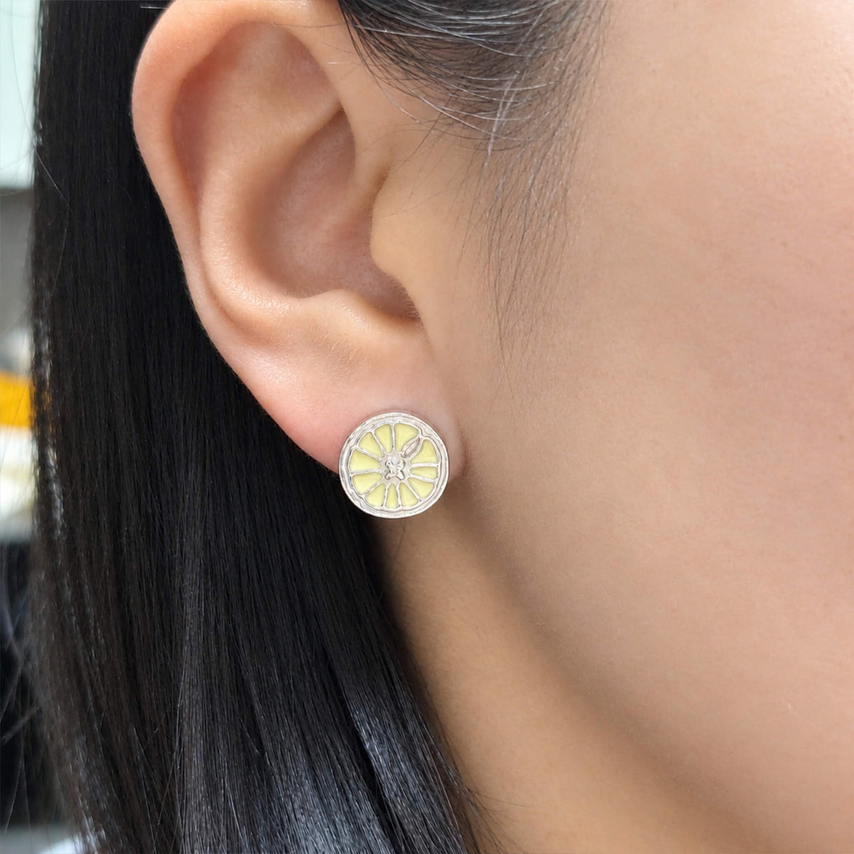 WearingOrangeEarring
