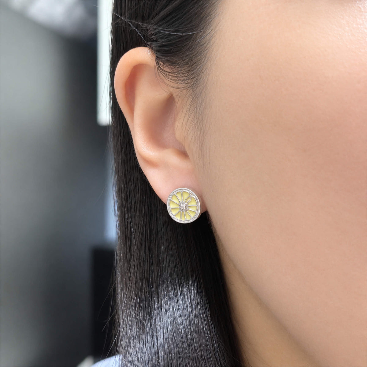 WearingOrangeEarring2