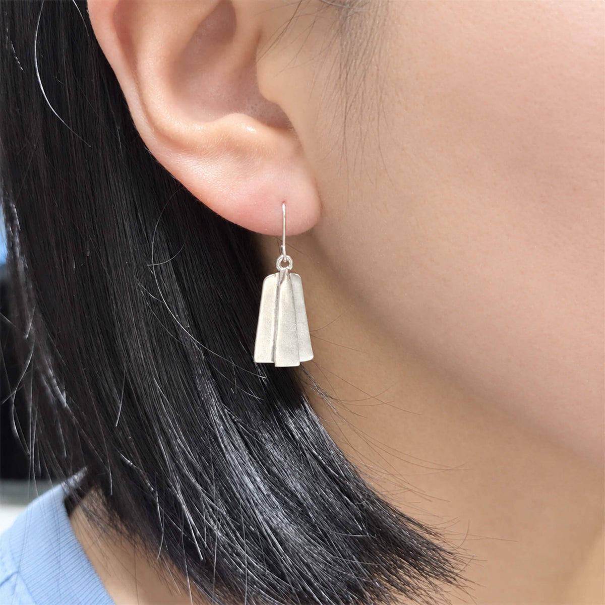 WearingPaviseShieldEarring