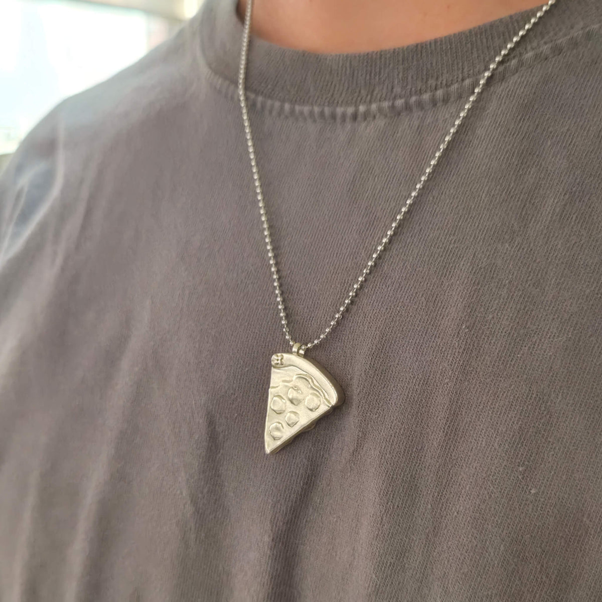 WearingPizzaNecklaceSideView