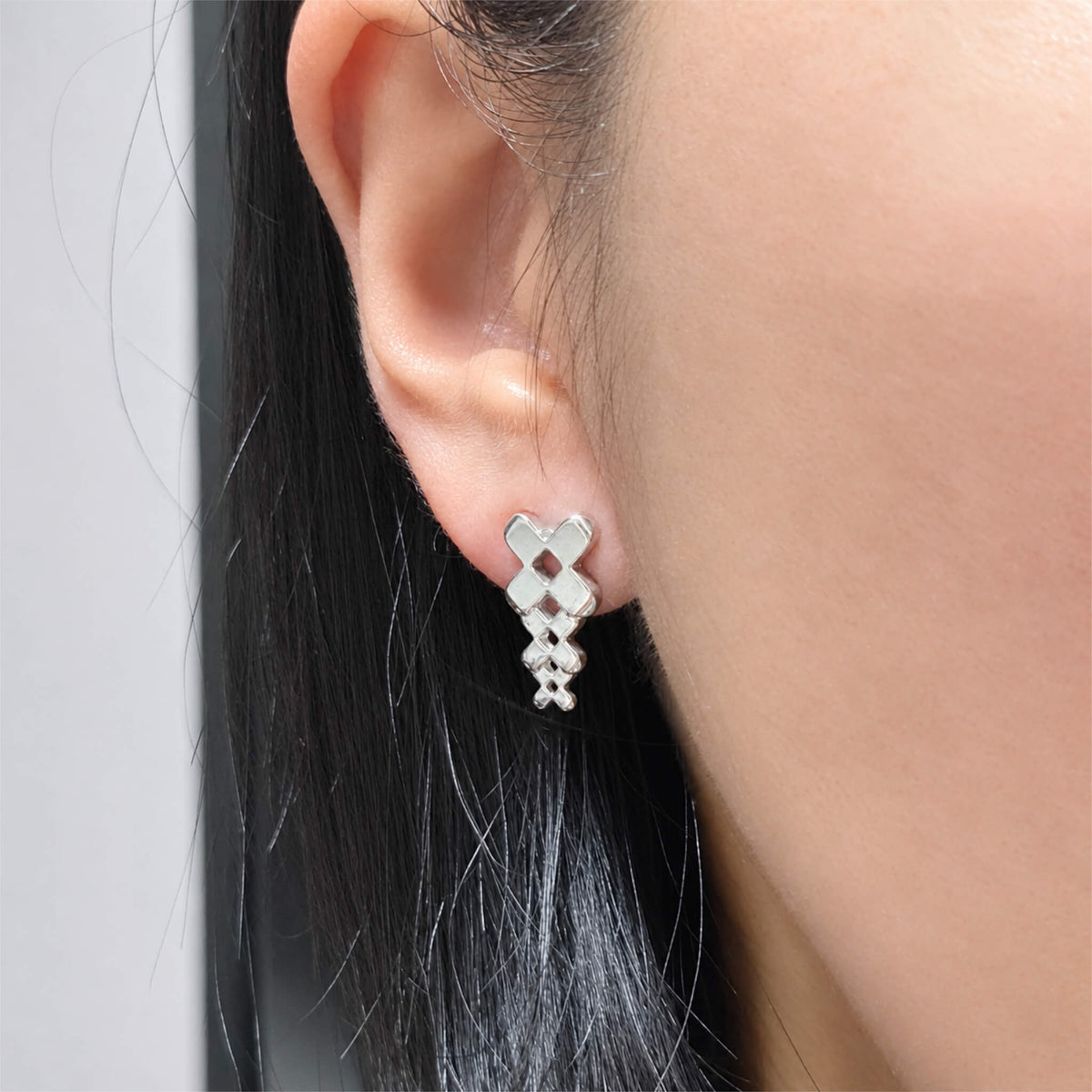 WearingThreeBandagesEarring